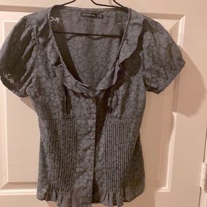 Stylish grey blouse w/ruffled neckline, capped sleeves & mock empire waist